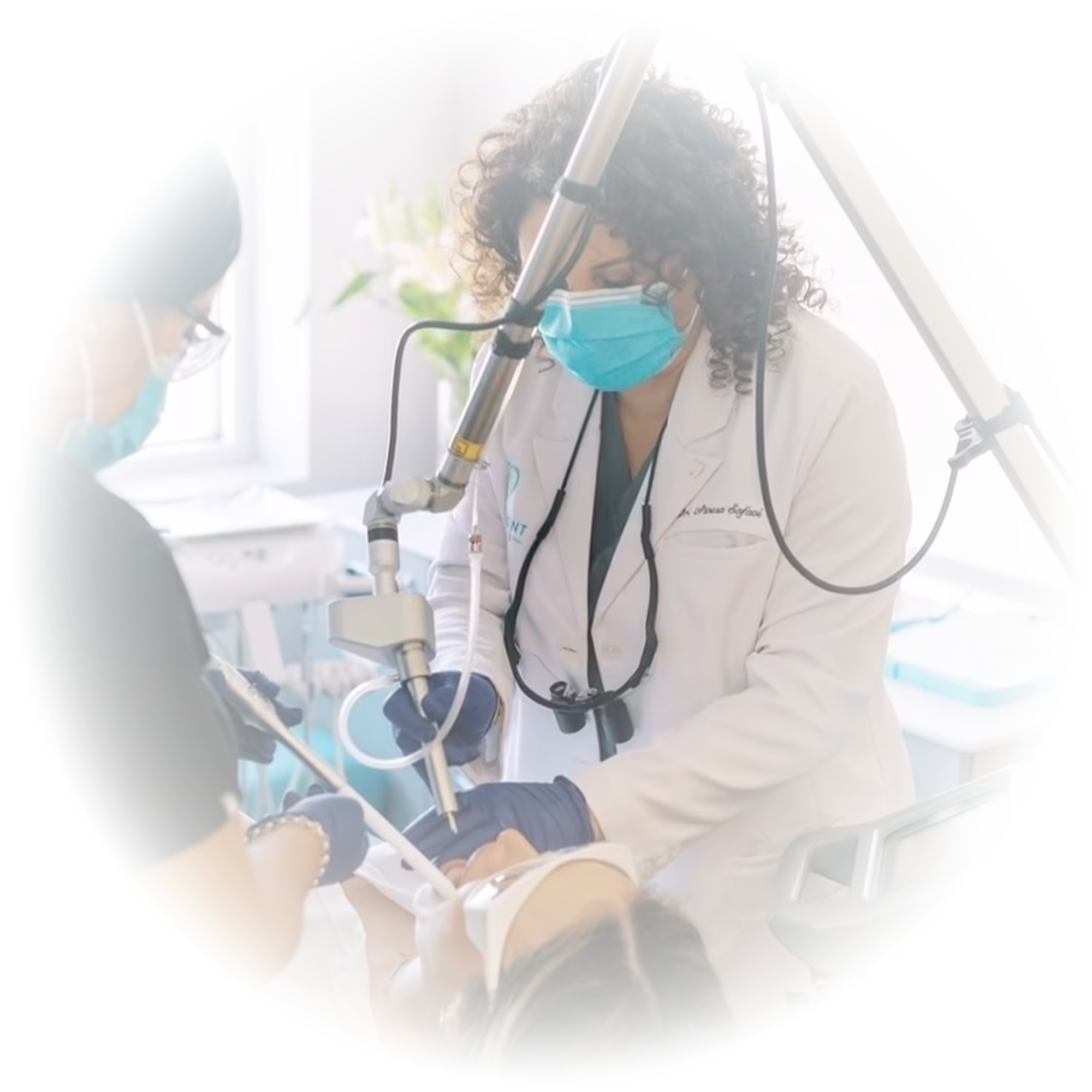 Clinicians performing a laser-assisted procedure during DEKA Dental Academy ELITE training