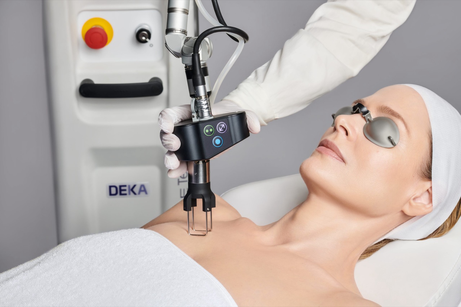 Clinician performing a DEKA aesthetic laser treatment